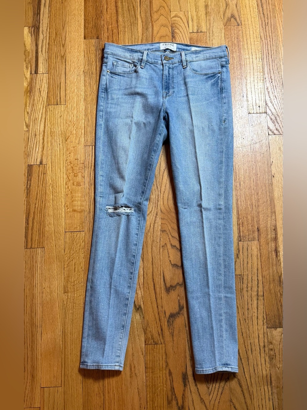 Frame Denim Pale Blue Skinny Jeans with Knee Rip